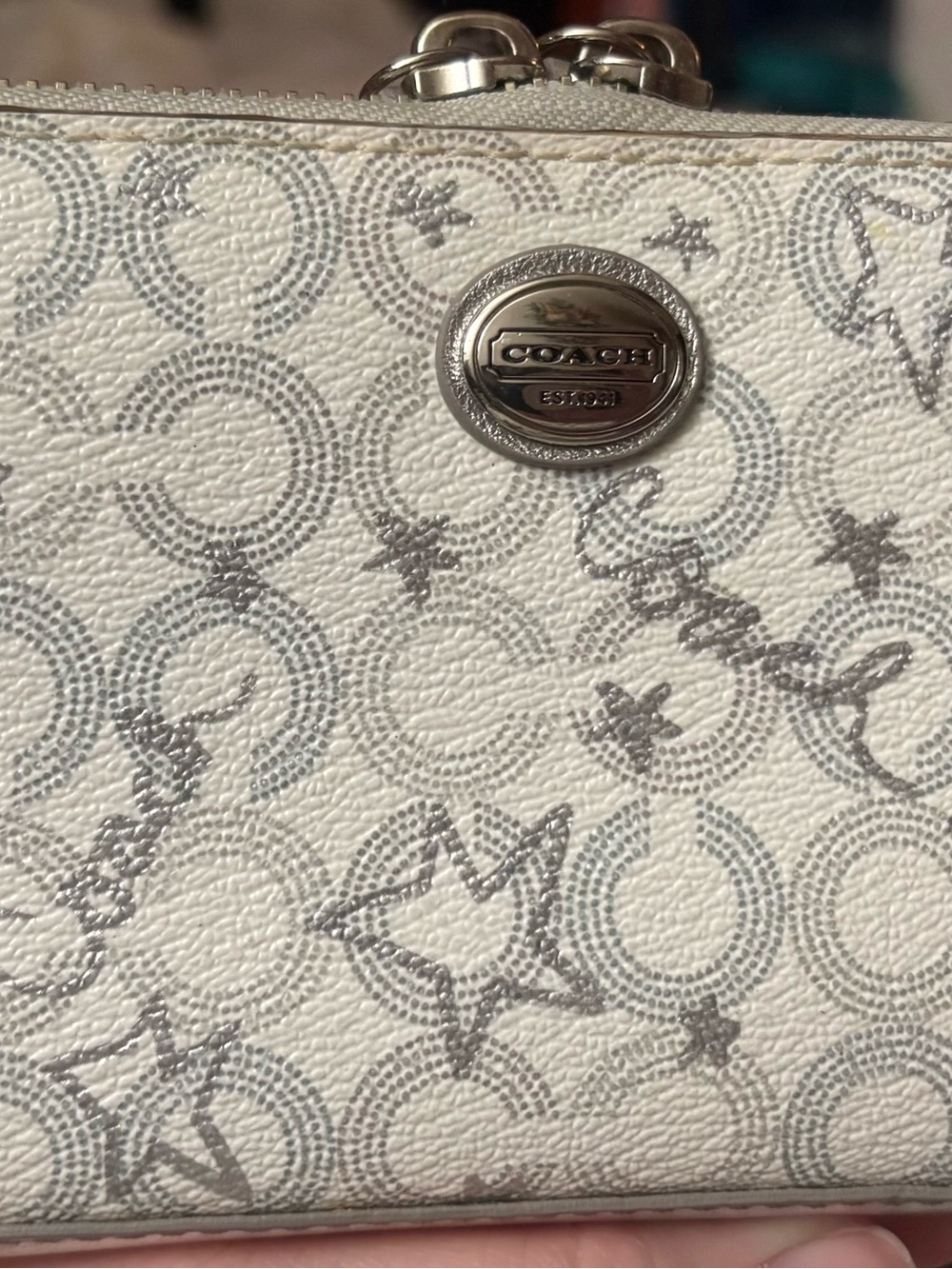 Coach Peyton accordion zip wallet star logo